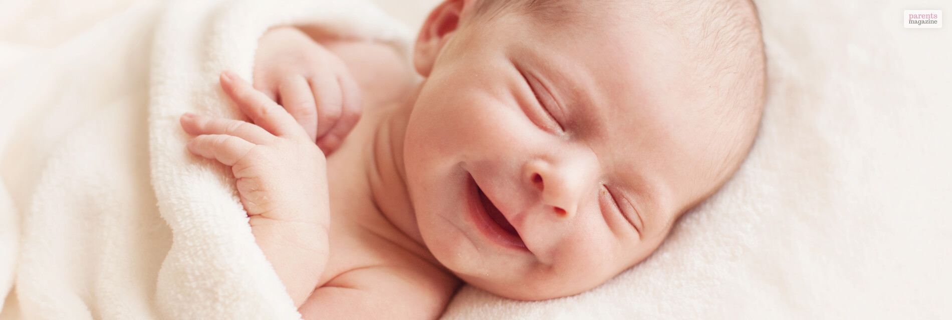 Why do babies smile in their sleep