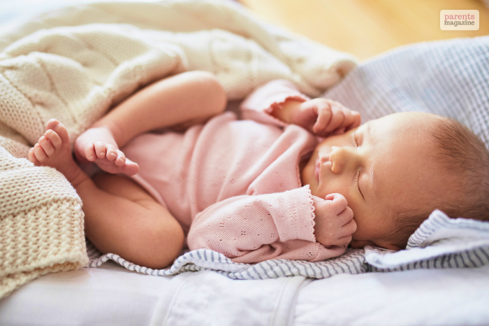 newborn grunting and squirming while sleeping