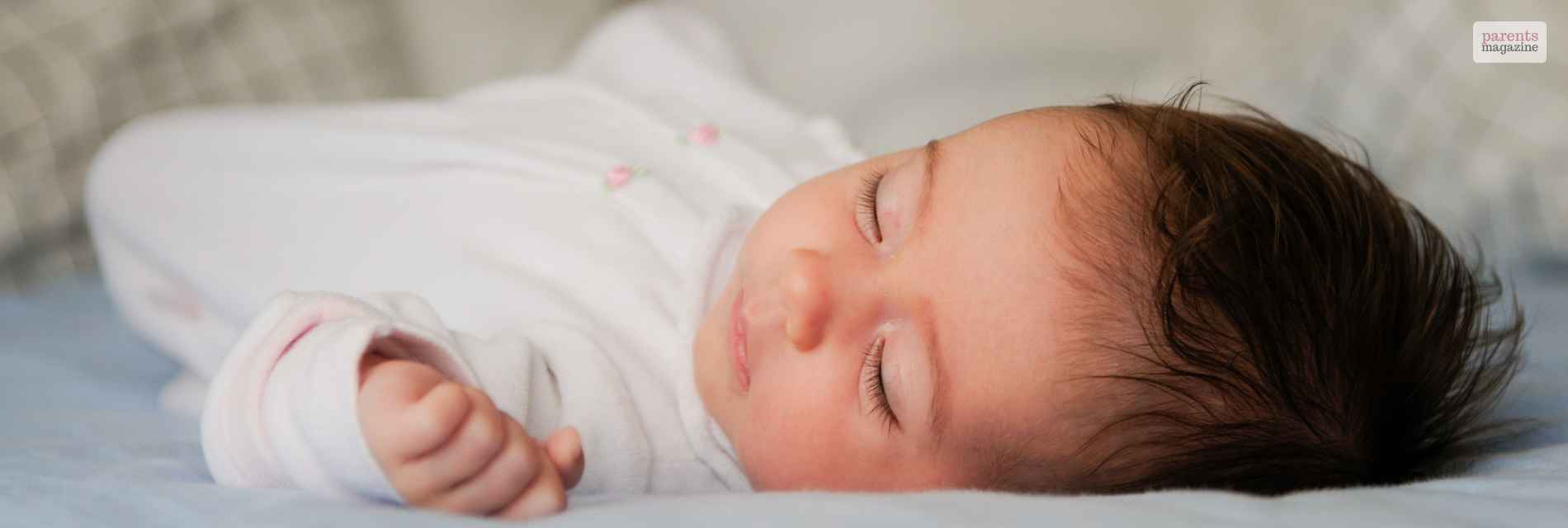 newborn rolls to side while sleeping