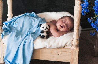 How to get newborn to sleep in bassinet