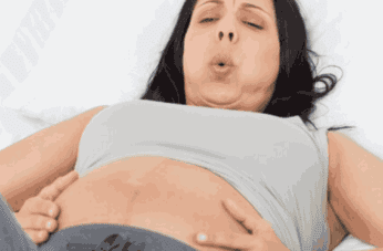 when does your stomach get hard during pregnancy